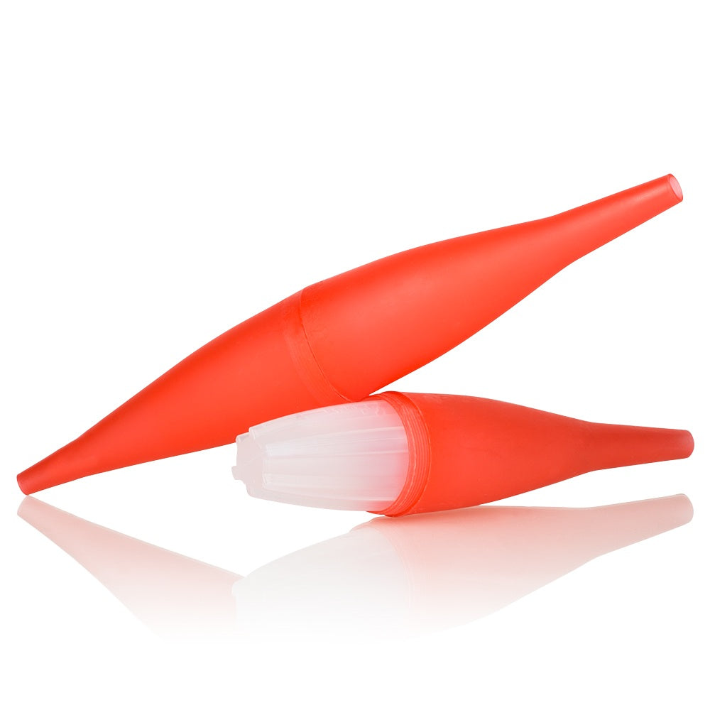 Red ice bazooka taken apart: two tapered halves and the white ribbed cooling core sticking out of the lower half.