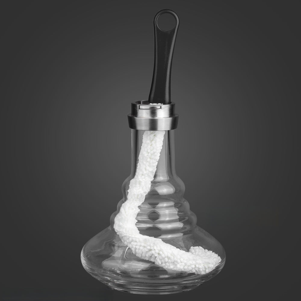 Flexible cleaning brush with a black handle and a white fibre head, bent inside a clear glass hookah base right down to the bottom.