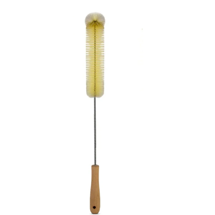 Yellow bottle brush with a wooden handle and a long twisted steel wire, photographed from the side on a white background.